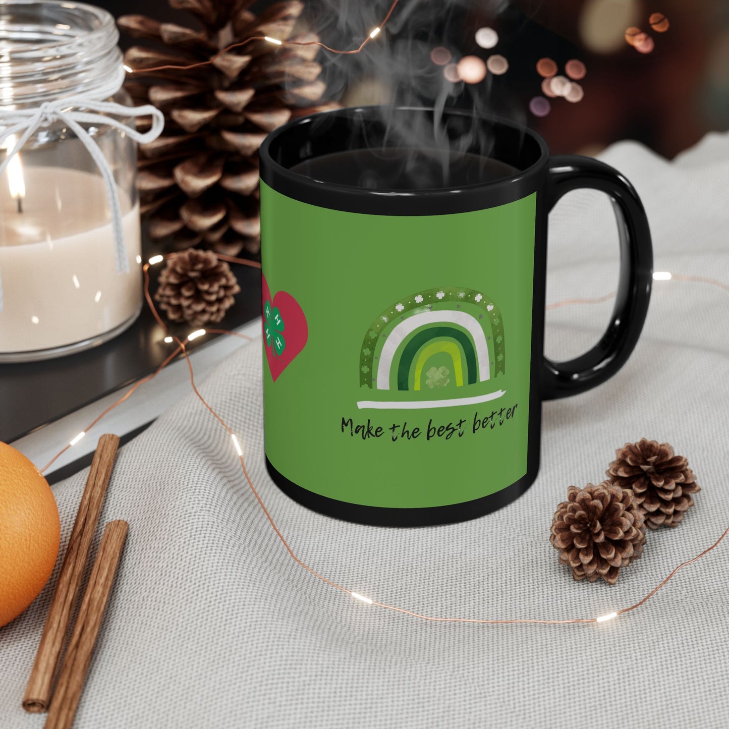 4-H Grows Here Black Mug With Green Overlay, 4-H Logo, and Make The Best Better Rainbow (11oz, 15oz)
