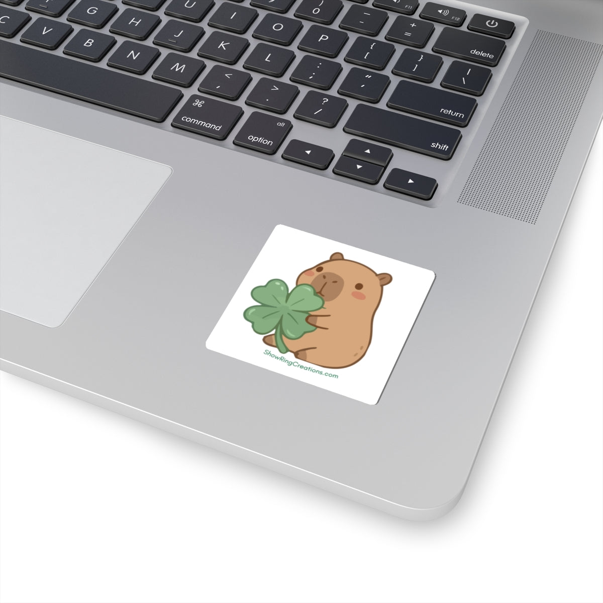 Cute Capybara Sticker — Kawaii Animal Holding 4-H-Like Four-Leaf Clover with ShowRingCreations.com Text Underneath